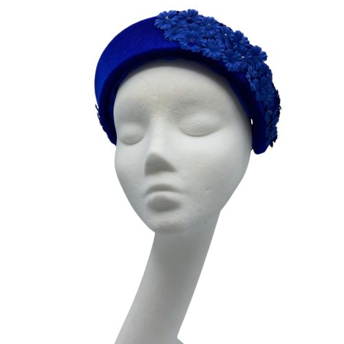  Blue velvet headpiece band with beautiful embellished mini flower detail.